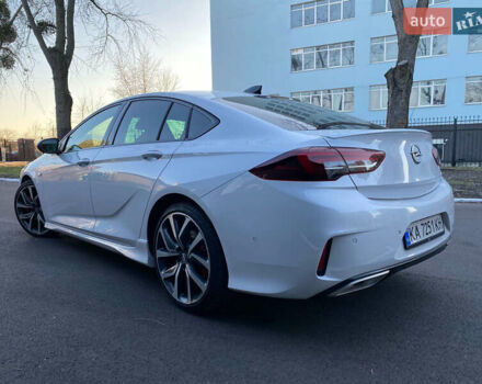 Белый Опель Инсигния, объемом двигателя 2 л и пробегом 90 тыс. км за 25000 $, фото 4 на Automoto.ua