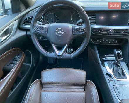 Белый Опель Инсигния, объемом двигателя 2 л и пробегом 90 тыс. км за 25000 $, фото 30 на Automoto.ua