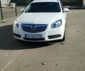 Белый Опель Инсигния, объемом двигателя 2 л и пробегом 185 тыс. км за 6500 $, фото 1 на Automoto.ua