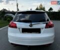 Белый Опель Инсигния, объемом двигателя 2 л и пробегом 245 тыс. км за 7200 $, фото 2 на Automoto.ua