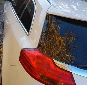 Білий Опель Інсігнія, об'ємом двигуна 1.96 л та пробігом 333 тис. км за 5900 $, фото 6 на Automoto.ua