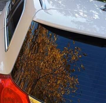 Білий Опель Інсігнія, об'ємом двигуна 1.96 л та пробігом 333 тис. км за 5900 $, фото 7 на Automoto.ua