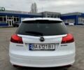 Белый Опель Инсигния, объемом двигателя 1.96 л и пробегом 193 тыс. км за 6500 $, фото 5 на Automoto.ua
