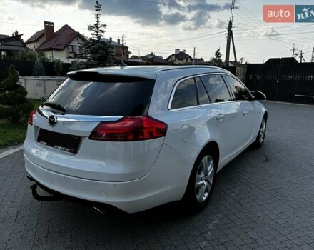 Белый Опель Инсигния, объемом двигателя 2 л и пробегом 245 тыс. км за 7200 $, фото 4 на Automoto.ua