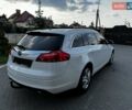 Белый Опель Инсигния, объемом двигателя 2 л и пробегом 245 тыс. км за 7200 $, фото 4 на Automoto.ua