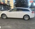 Белый Опель Инсигния, объемом двигателя 2 л и пробегом 222 тыс. км за 8799 $, фото 1 на Automoto.ua