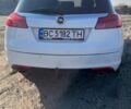 Білий Опель Інсігнія, об'ємом двигуна 1.96 л та пробігом 260 тис. км за 7400 $, фото 23 на Automoto.ua