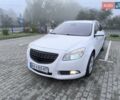 Белый Опель Инсигния, объемом двигателя 2 л и пробегом 138 тыс. км за 8300 $, фото 1 на Automoto.ua