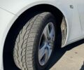 Белый Опель Инсигния, объемом двигателя 2 л и пробегом 276 тыс. км за 5500 $, фото 2 на Automoto.ua
