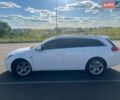 Белый Опель Инсигния, объемом двигателя 2 л и пробегом 324 тыс. км за 7499 $, фото 2 на Automoto.ua