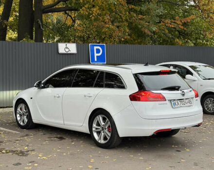 Опель Инсигния 2010 в Броварах на Automoto.ua Белый Опель Инсигния, объемом двигателя 1.96 л и пробегом 311 тыс. км за 7500 $, фото 4 на Automoto.ua