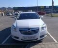 Белый Опель Инсигния, объемом двигателя 2 л и пробегом 315 тыс. км за 7200 $, фото 1 на Automoto.ua