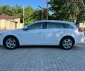Білий Опель Інсігнія, об'ємом двигуна 2 л та пробігом 249 тис. км за 7709 $, фото 2 на Automoto.ua