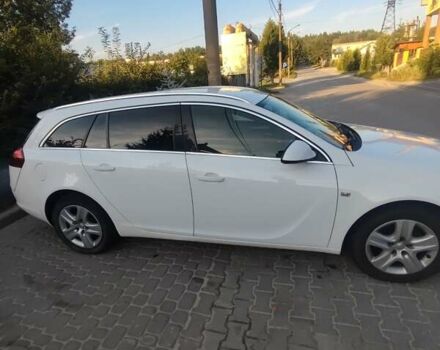 Белый Опель Инсигния, объемом двигателя 2 л и пробегом 212 тыс. км за 6399 $, фото 5 на Automoto.ua