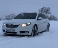 Білий Опель Інсігнія, об'ємом двигуна 2 л та пробігом 300 тис. км за 7500 $, фото 2 на Automoto.ua