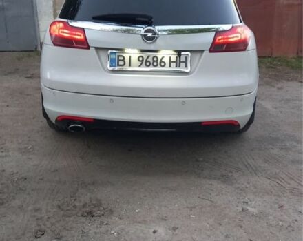 Белый Опель Инсигния, объемом двигателя 2 л и пробегом 240 тыс. км за 8600 $, фото 5 на Automoto.ua