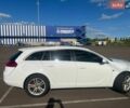 Белый Опель Инсигния, объемом двигателя 2 л и пробегом 324 тыс. км за 7499 $, фото 5 на Automoto.ua