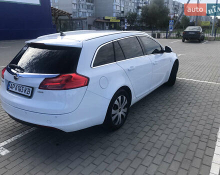 Білий Опель Інсігнія, об'ємом двигуна 1.96 л та пробігом 180 тис. км за 7999 $, фото 4 на Automoto.ua
