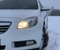 Білий Опель Інсігнія, об'ємом двигуна 2 л та пробігом 300 тис. км за 7500 $, фото 3 на Automoto.ua