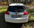 Білий Опель Інсігнія, об'ємом двигуна 1.96 л та пробігом 190 тис. км за 6999 $, фото 4 на Automoto.ua