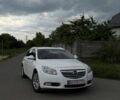 Белый Опель Инсигния, объемом двигателя 2 л и пробегом 298 тыс. км за 6200 $, фото 1 на Automoto.ua