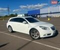 Белый Опель Инсигния, объемом двигателя 2 л и пробегом 324 тыс. км за 7499 $, фото 1 на Automoto.ua