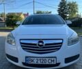 Білий Опель Інсігнія, об'ємом двигуна 2 л та пробігом 249 тис. км за 7709 $, фото 1 на Automoto.ua