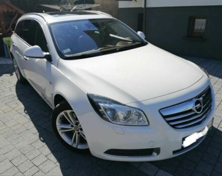 Белый Опель Инсигния, объемом двигателя 2 л и пробегом 289 тыс. км за 8000 $, фото 4 на Automoto.ua