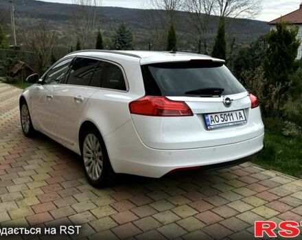 Білий Опель Інсігнія, об'ємом двигуна 2 л та пробігом 167 тис. км за 8500 $, фото 5 на Automoto.ua