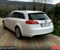 Білий Опель Інсігнія, об'ємом двигуна 2 л та пробігом 167 тис. км за 8500 $, фото 5 на Automoto.ua