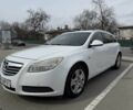 Белый Опель Инсигния, объемом двигателя 2 л и пробегом 318 тыс. км за 6999 $, фото 1 на Automoto.ua