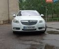 Белый Опель Инсигния, объемом двигателя 1.96 л и пробегом 285 тыс. км за 7200 $, фото 1 на Automoto.ua