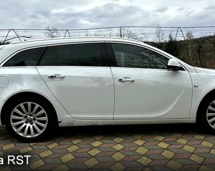 Білий Опель Інсігнія, об'ємом двигуна 2 л та пробігом 167 тис. км за 8500 $, фото 3 на Automoto.ua