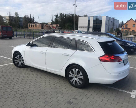 Білий Опель Інсігнія, об'ємом двигуна 1.96 л та пробігом 180 тис. км за 7999 $, фото 6 на Automoto.ua