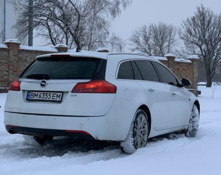 Білий Опель Інсігнія, об'ємом двигуна 2 л та пробігом 300 тис. км за 7500 $, фото 4 на Automoto.ua