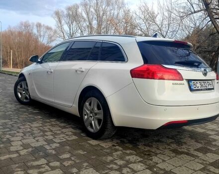 Белый Опель Инсигния, объемом двигателя 2 л и пробегом 225 тыс. км за 7000 $, фото 3 на Automoto.ua