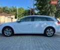 Білий Опель Інсігнія, об'ємом двигуна 2 л та пробігом 247 тис. км за 7400 $, фото 4 на Automoto.ua