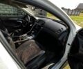 Білий Опель Інсігнія, об'ємом двигуна 2 л та пробігом 273 тис. км за 7000 $, фото 5 на Automoto.ua
