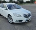 Білий Опель Інсігнія, об'ємом двигуна 2 л та пробігом 223 тис. км за 8700 $, фото 1 на Automoto.ua