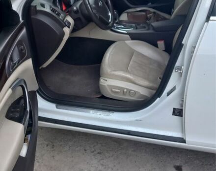 Белый Опель Инсигния, объемом двигателя 2 л и пробегом 240 тыс. км за 8600 $, фото 2 на Automoto.ua