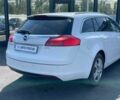 Білий Опель Інсігнія, об'ємом двигуна 2 л та пробігом 319 тис. км за 6479 $, фото 5 на Automoto.ua