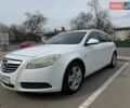 Белый Опель Инсигния, объемом двигателя 1.96 л и пробегом 318 тыс. км за 6999 $, фото 1 на Automoto.ua