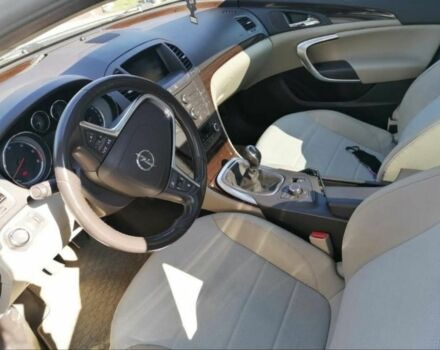 Белый Опель Инсигния, объемом двигателя 2 л и пробегом 289 тыс. км за 8000 $, фото 6 на Automoto.ua