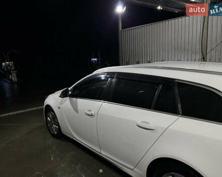 Белый Опель Инсигния, объемом двигателя 1.96 л и пробегом 295 тыс. км за 6450 $, фото 6 на Automoto.ua