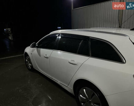 Белый Опель Инсигния, объемом двигателя 1.96 л и пробегом 295 тыс. км за 6450 $, фото 5 на Automoto.ua