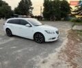 Білий Опель Інсігнія, об'ємом двигуна 2 л та пробігом 195 тис. км за 7999 $, фото 2 на Automoto.ua