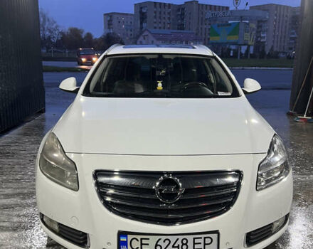 Білий Опель Інсігнія, об'ємом двигуна 2 л та пробігом 263 тис. км за 7700 $, фото 1 на Automoto.ua