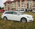 Білий Опель Інсігнія, об'ємом двигуна 2 л та пробігом 245 тис. км за 7300 $, фото 5 на Automoto.ua
