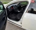 Білий Опель Інсігнія, об'ємом двигуна 2 л та пробігом 195 тис. км за 7999 $, фото 4 на Automoto.ua