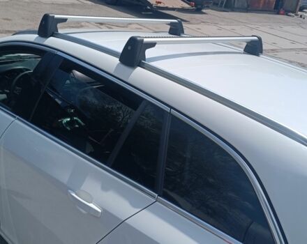 Белый Опель Инсигния, объемом двигателя 2 л и пробегом 260 тыс. км за 8500 $, фото 1 на Automoto.ua